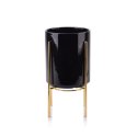 Doniczka na stojaku Neva czarna 23,5 cm Wykonana z ceramiki, metalowy stojak w kolorze złotym, idealna dekoracja każdego wnętrza