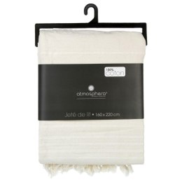 Narzuta na łóżko 160x220 frędzle kremowaKremowa narzuta na łóżko wykonana z 100% z bawełny, wykończona kosmykami frędzli, ciepła