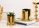 Doniczka ze spodkiem Hanya Gold 13 cm Wykonana z ceramiki w kolorze złotym. Zestaw zawiera doniczke oraz spodek. Wymiary 13x13x1