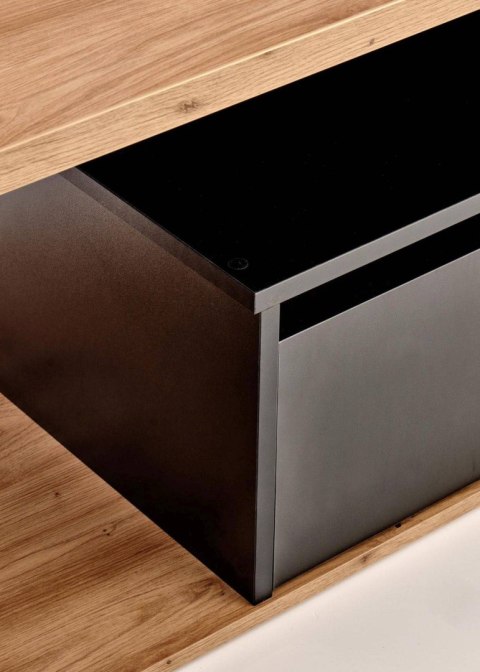 Ława Pantera Black dąb wotan 110x60 cm Wykonana z płyty meblowej z okleiną w kolorze czarnym i dąb wotan, stanowić będzie elegan