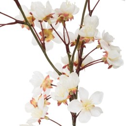 Wazon szklany z białą kwitnącą gałązką Dekoracyjna kompozycja ze sztucznymi gałązkami kwitnącej wiśni, ozdobne kwiaty umieszczon