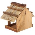 Drewniany karmnik dla ptaków kryty strzechą
