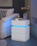 Biały stolik nocny z oświetleniem LED Nowoczesny stolik boczny nocny z 3 szufladami oraz oświetleniem LED, który posiada 25 kolo