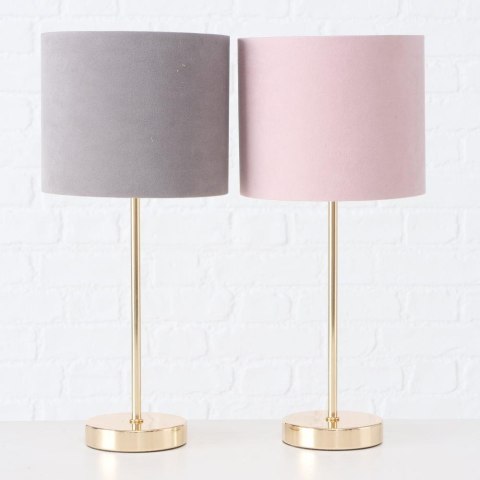 Lampa stołowa Lorie szaraElegancka lampa na metalowej nóżce z szarym abażurem, o wymiarach 18x40 cm