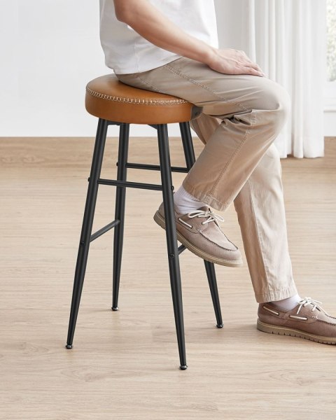 Zestaw 2 wysokich hokerów karmelowy brąz Zestaw dwóch wysokich stabilnych hokerów wykonanych ze stali i pianki o wysokiej spręży