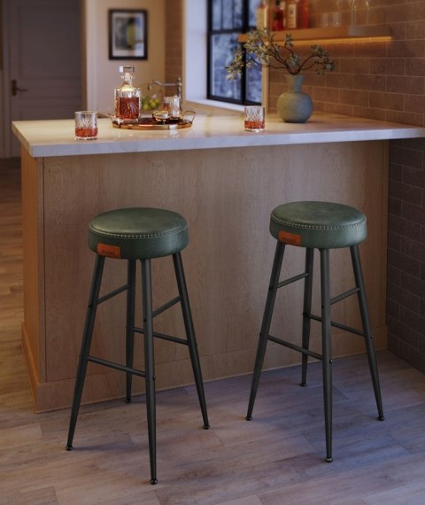 Zestaw 2 wysokich hokerów leśna zieleń Zestaw dwóch wysokich stabilnych hokerów wykonanych ze stali i pianki o wysokiej sprężys